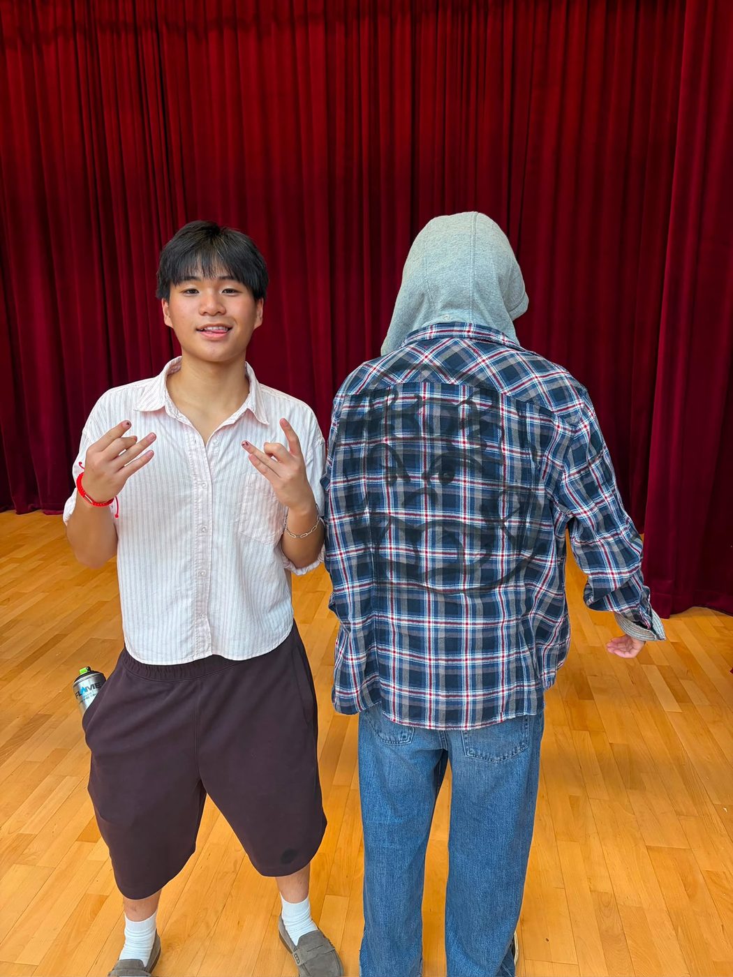 Plaid flannel shirt sprayed with the MOGI face